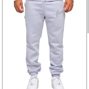 Filthy wealth blue sweatpants with rhinestone logo